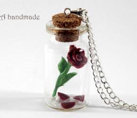 Rose with fallen petals in a glass jar necklace